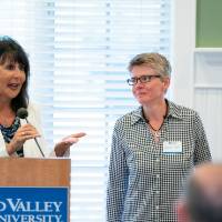 President Philomena V. Mantella is joined up front by faculty member, Laurence José, and Provost Cimitile